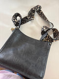 Stylish Gray Handbag with Leopard Print Strap
