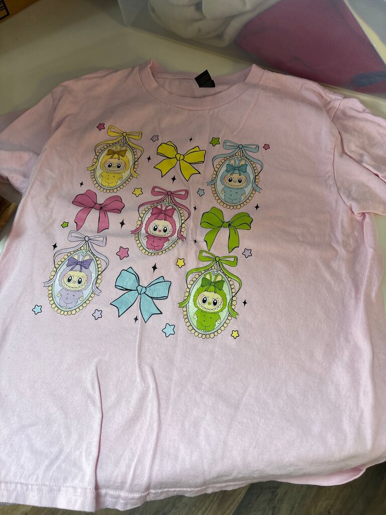 Cute Pink Graphic Tee with Cartoon Characters