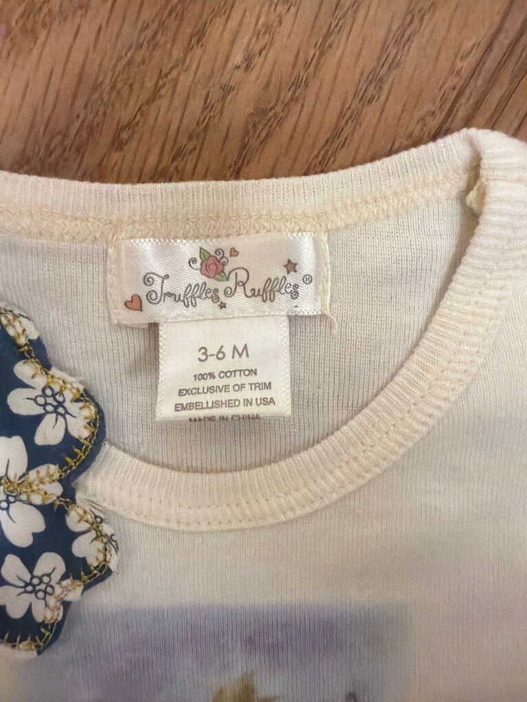 Truffles Ruffles Infant Shirt with Floral Design