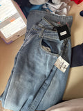 Light Blue Denim Jeans with Distressed Detail