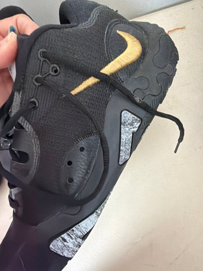 Black Athletic Shoes with Gold Accent