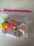 Colorful toy dinosaurs and accessories