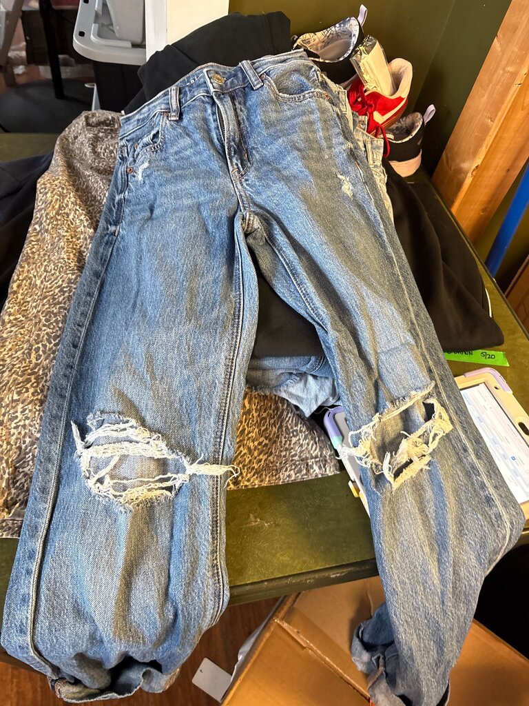 Distressed Blue Denim Jeans
