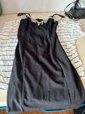 Elegant Black Dress with Embellished Neckline