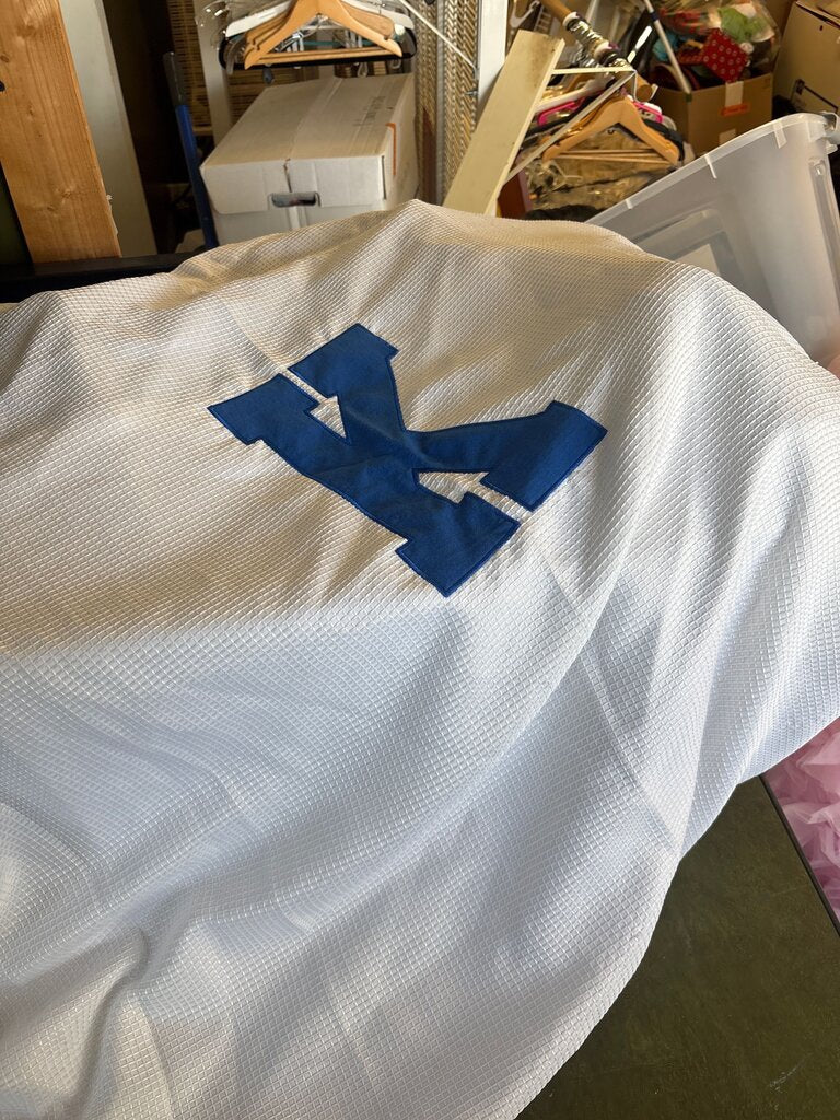 White Sports Jersey with Blue Lettering
