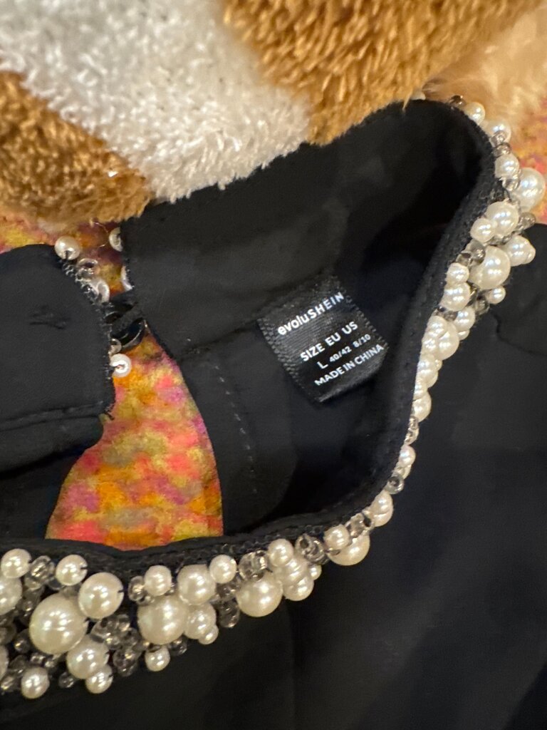 Elegant Black Blouse with Pearl Embellishments